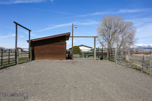 view of outbuilding featuring a rural view