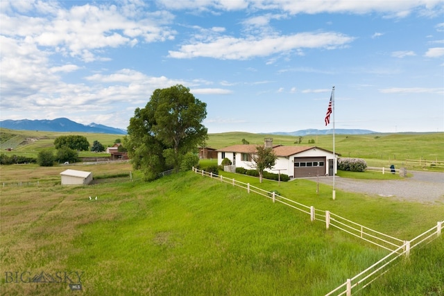 exterior space with a mountain view and a rural view