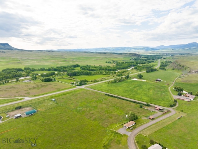 bird's eye view with a mountain view and a rural view