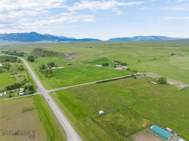 aerial view featuring a mountain view and a rural view