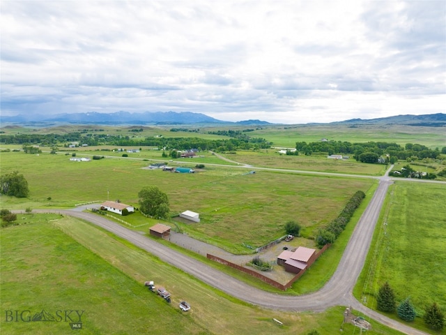 bird's eye view with a mountain view and a rural view