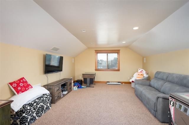 living room featuring vaulted ceiling and carpet floors