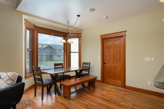 dining area featuring light wood-type flooring