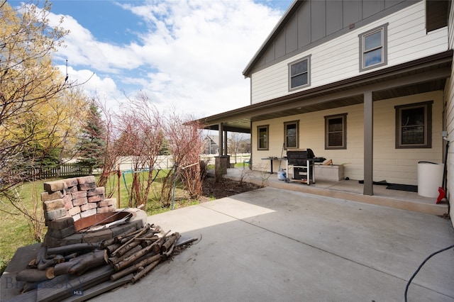 view of patio featuring a grill