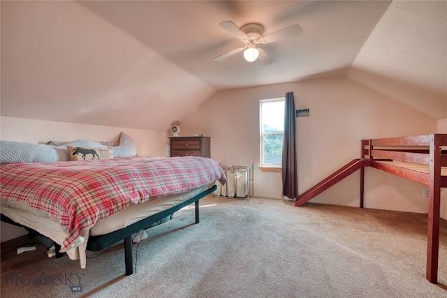 carpeted bedroom with lofted ceiling and ceiling fan