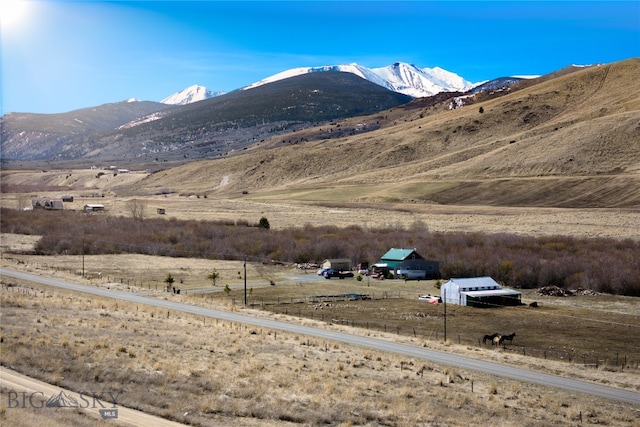 view of mountain feature featuring a rural view