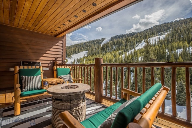 view of snow covered deck