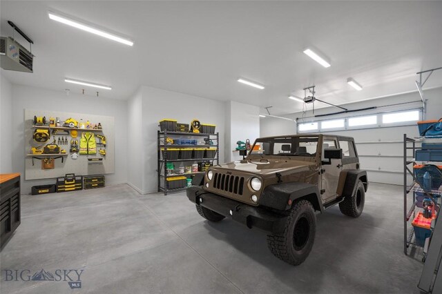 garage featuring a garage door opener