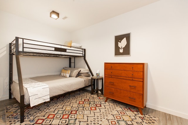 bedroom featuring light wood-type flooring