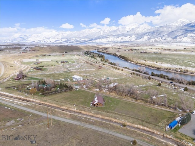 bird's eye view featuring a water and mountain view and a rural view