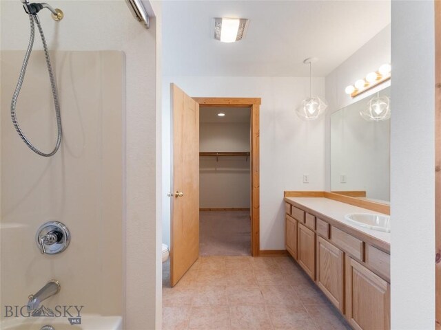 full bathroom with vanity, toilet, tub / shower combination, and tile patterned flooring