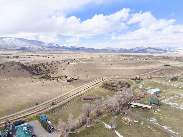 aerial view with a mountain view and a rural view