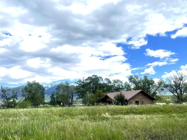 view of landscape with a mountain view and a rural view