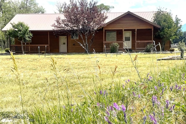 view of front of property featuring covered porch