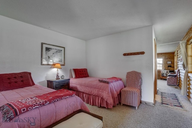 54 Torry Rd, Cameron, MT 59720 - carpeted bedroom featuring wood walls