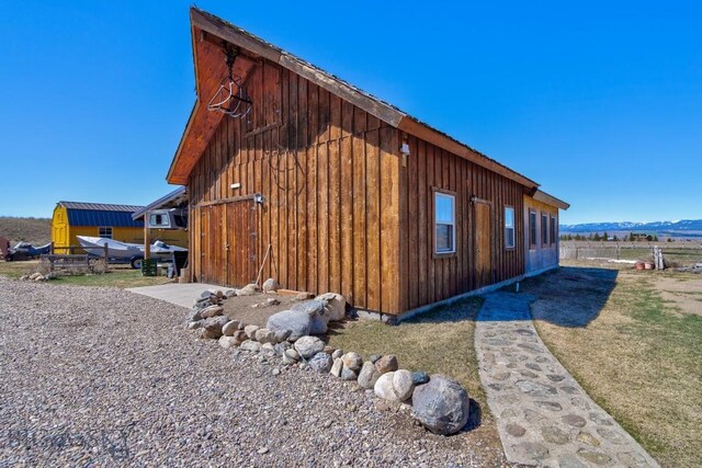 54 Torry Rd, Cameron, MT 59720 - view of property exterior with fence and board and batten siding