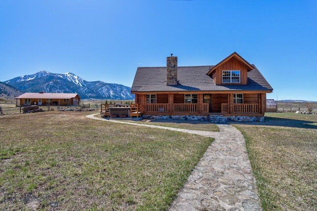54 Torry Rd, Cameron, MT 59720 - view of front facade featuring a mountain view and a chimney