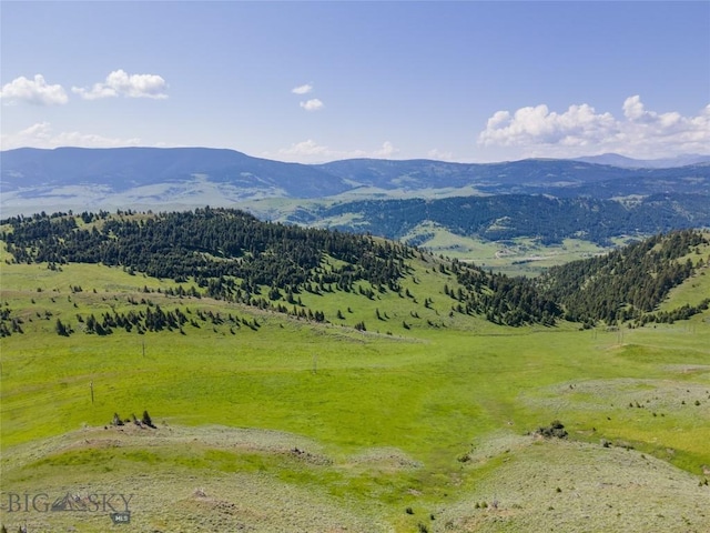 property view of mountains featuring a rural view