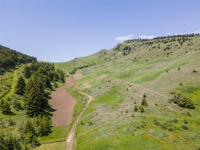 view of mountain feature with a rural view