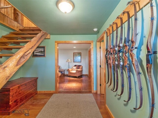 72 Sky Band Trl, Livingston, MT 59047 - hall with baseboards, wood finished floors, and stairs