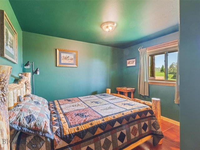 bedroom with wood-type flooring