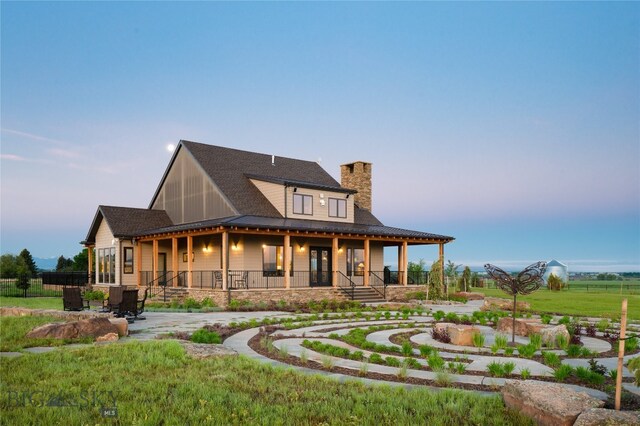 farmhouse inspired home featuring a porch