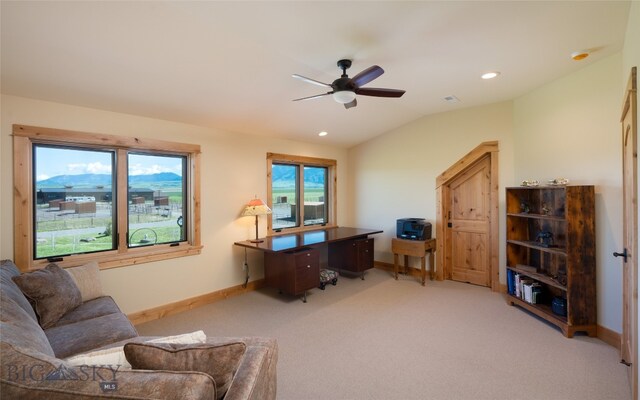 office area featuring carpet, ceiling fan, and lofted ceiling