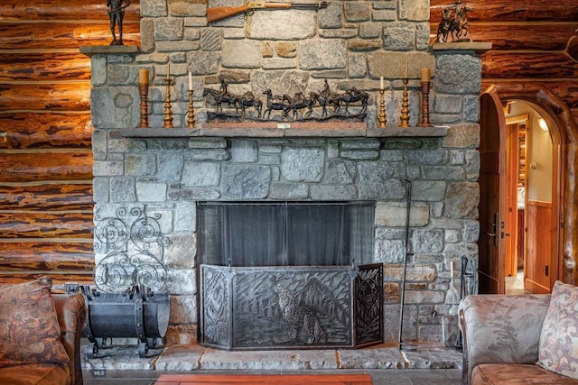 room details with log walls and a fireplace