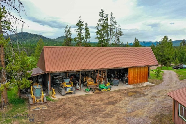 exterior space featuring a mountain view