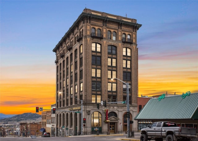 outdoor building at dusk featuring a mountain view