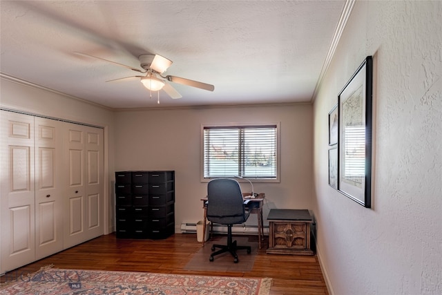 home office with ornamental molding, ceiling fan, a baseboard heating unit, and dark wood-type flooring