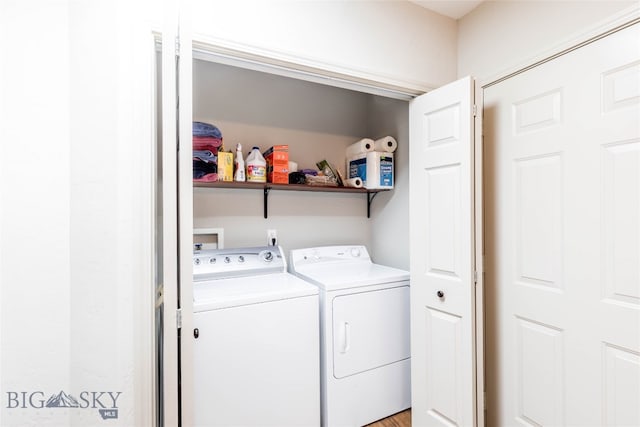 washroom featuring washer and clothes dryer