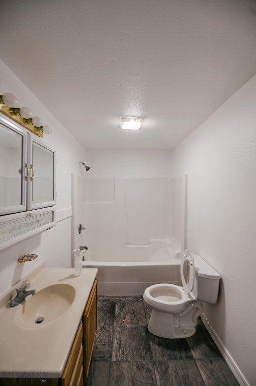 full bathroom with shower / bathtub combination, vanity, and toilet