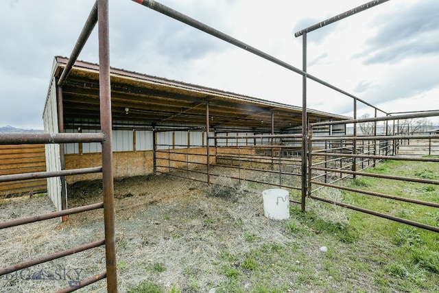 view of stable with an outdoor structure