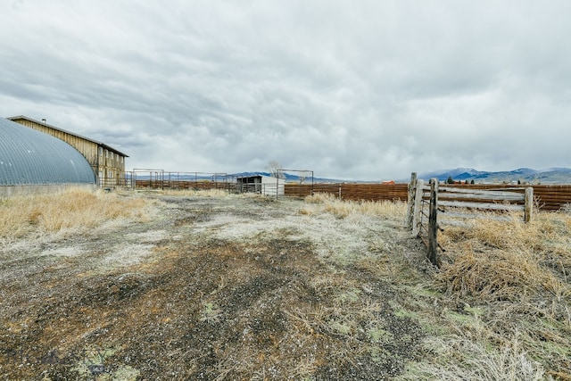 view of yard featuring a rural view