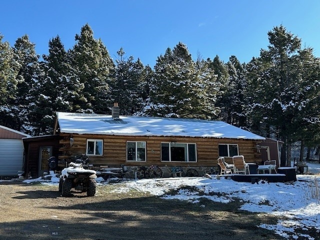 view of log cabin