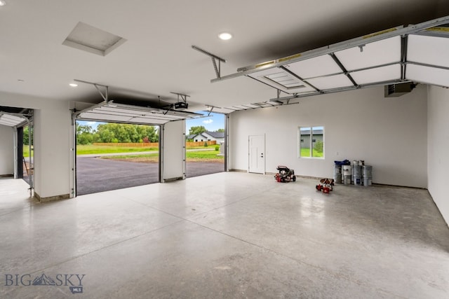 garage featuring a garage door opener