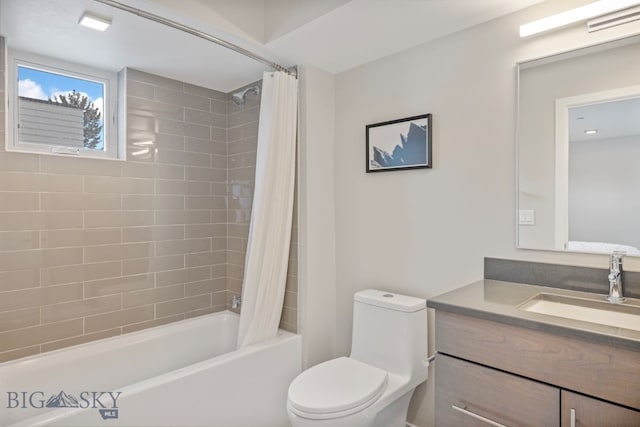 full bathroom featuring vanity, toilet, and shower / tub combo with curtain