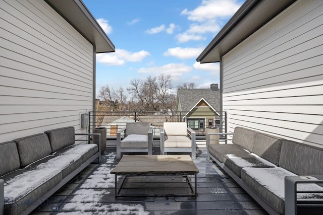 wooden deck featuring an outdoor hangout area