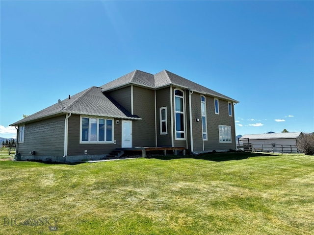 view of front of house with a front lawn