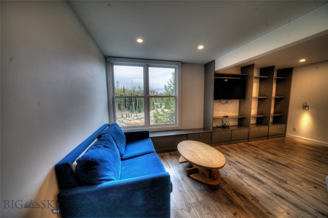 sitting room with hardwood / wood-style floors