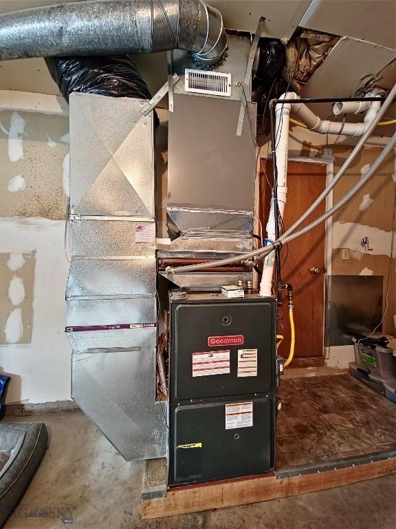 512 S Oak, Townsend, MT 59644 - utility room featuring heating unit