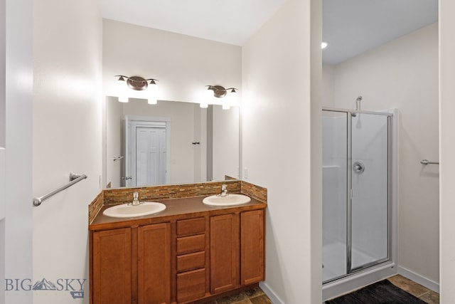 bathroom with vanity and walk in shower