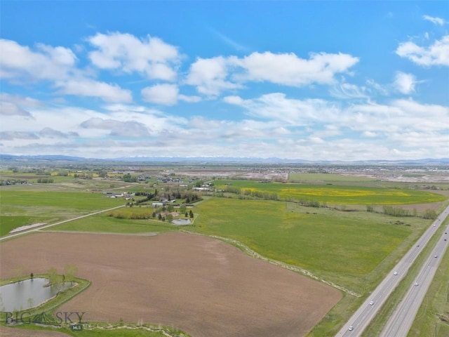 birds eye view of property with a rural view