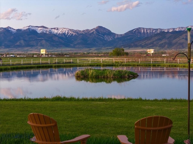 water view featuring a rural view and a mountain view