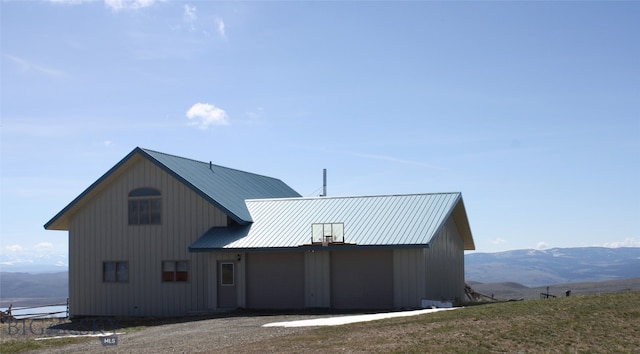 exterior space featuring a mountain view