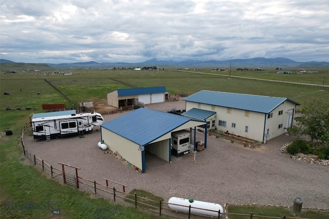 aerial view featuring a mountain view and a rural view