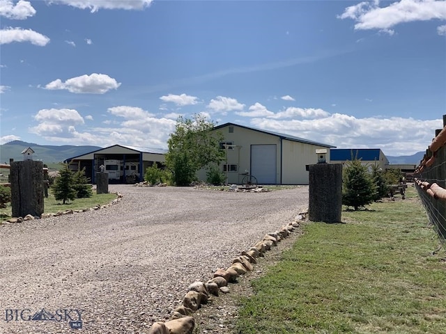 view of outbuilding with a garage