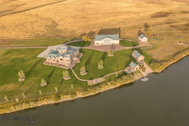 drone / aerial view with a rural view and a water view