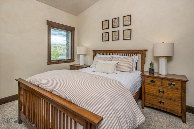 bedroom with light colored carpet